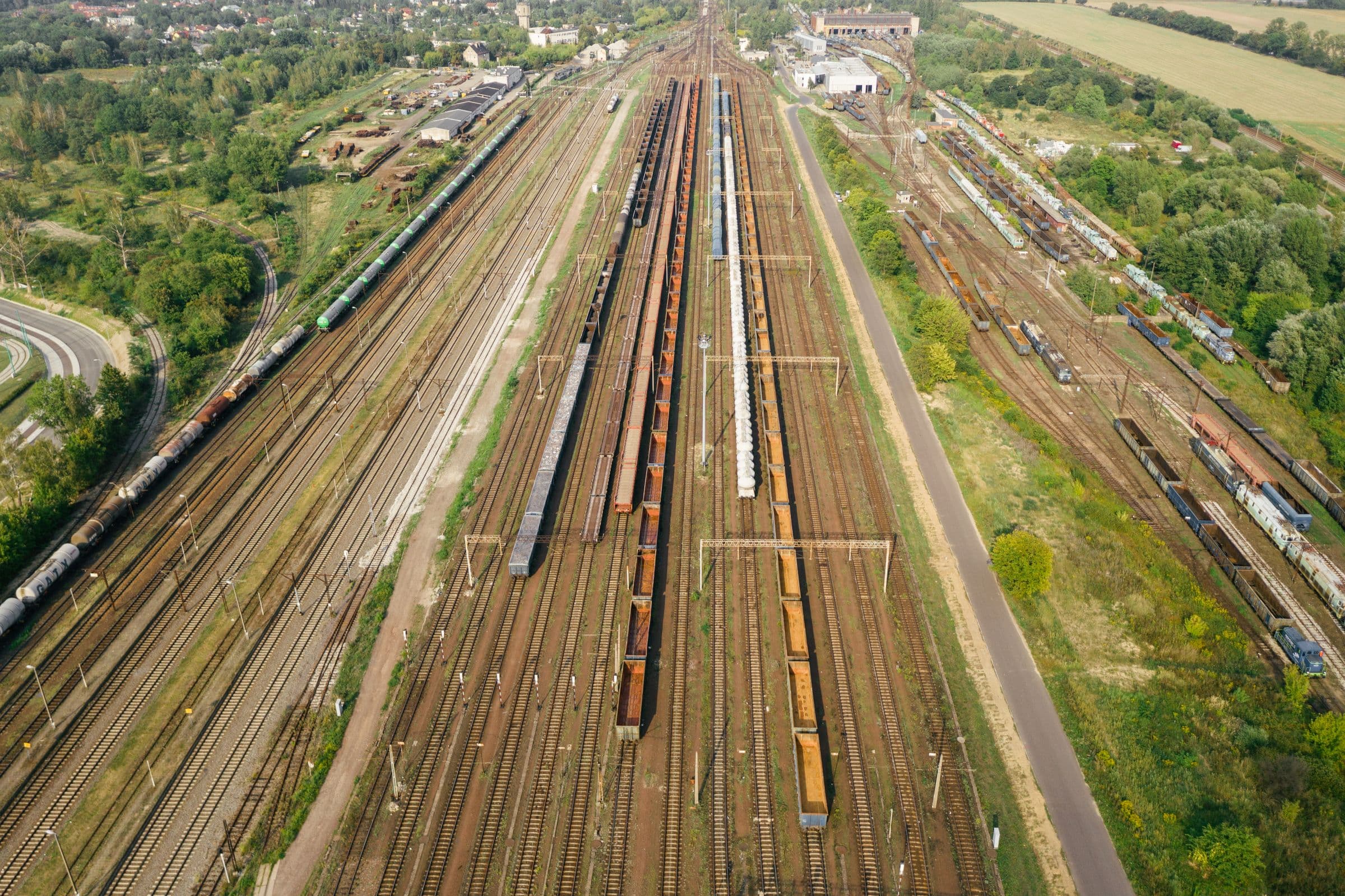 Railway yard with multiple tracks converging into the distance