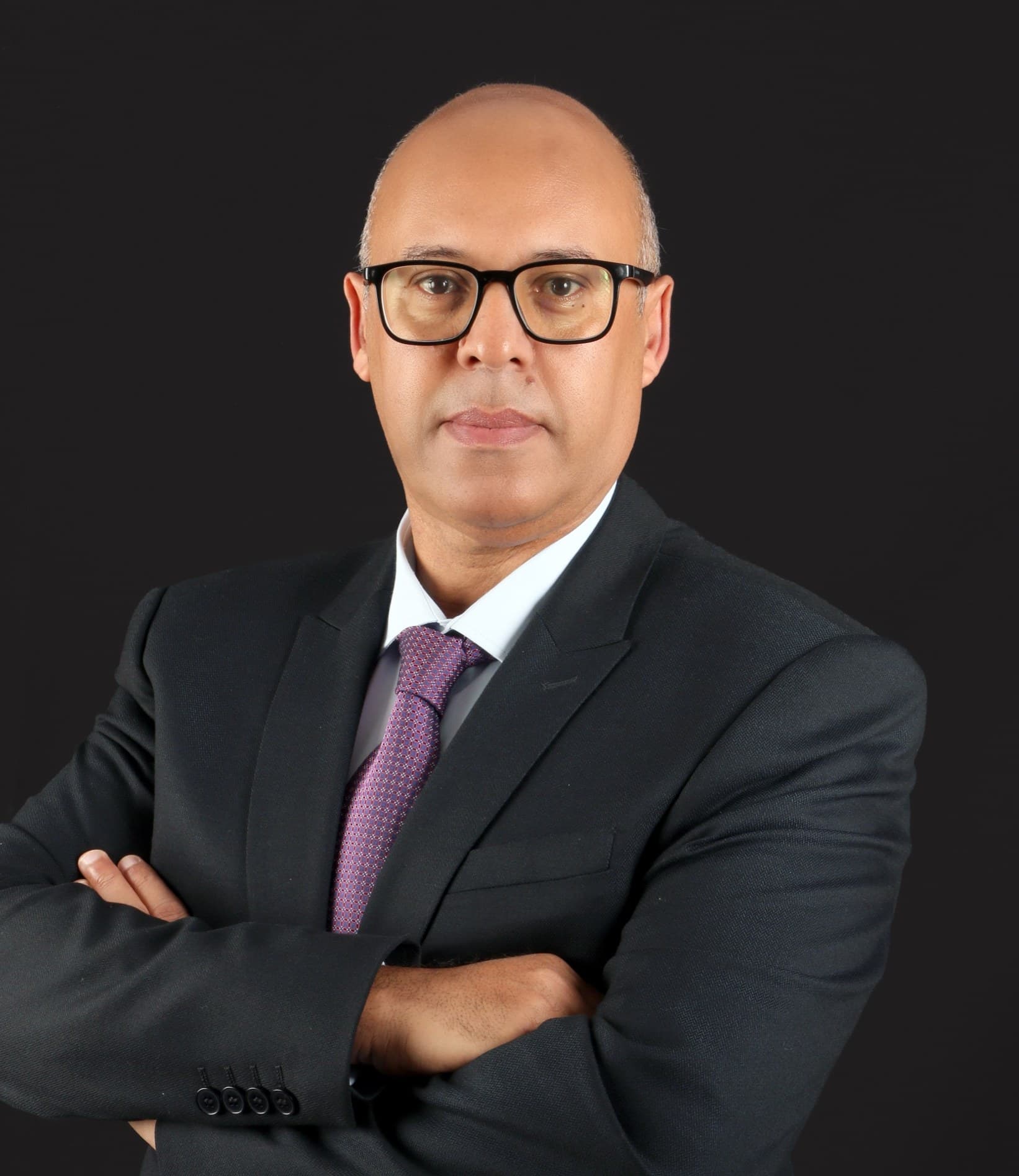 Portrait of Youssef Imghi, Founder & Chief Executive Officer of Portus Advisory International